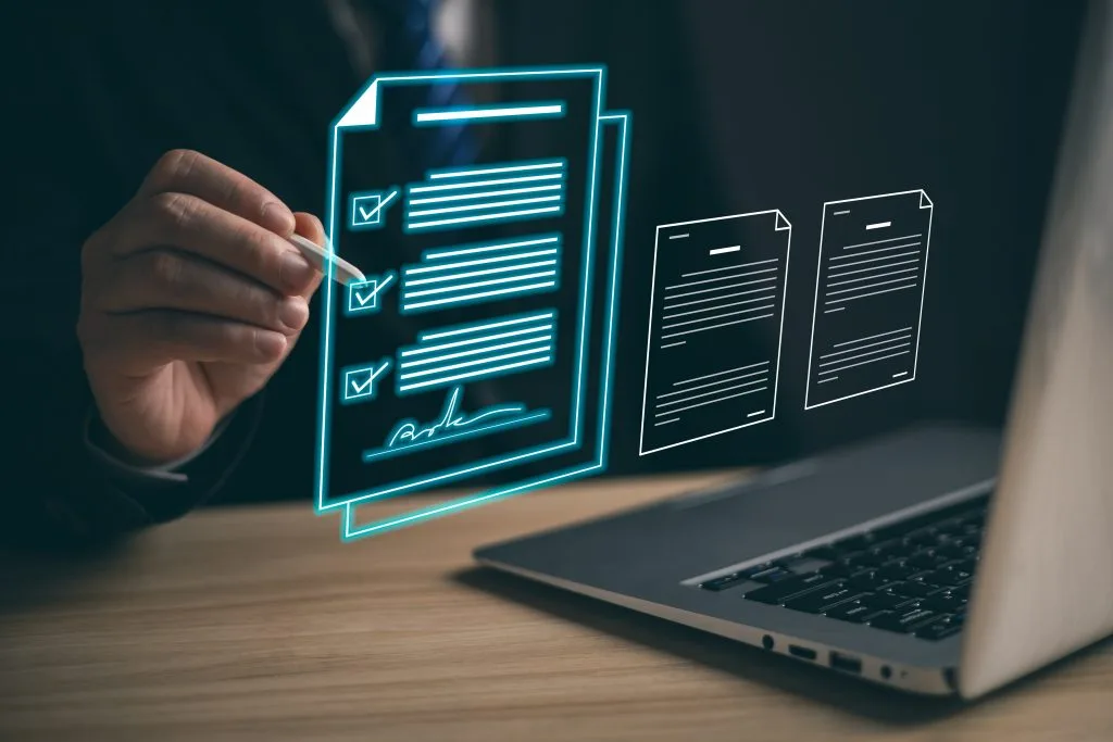 vecteezy_businessman-sign-digital-documents-online-in-the-office_45983473-1024x683
